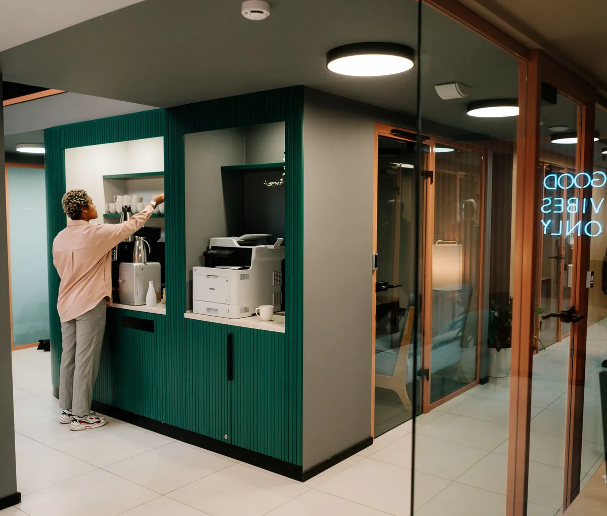An office pantry nook where staff help themselves to drinks
